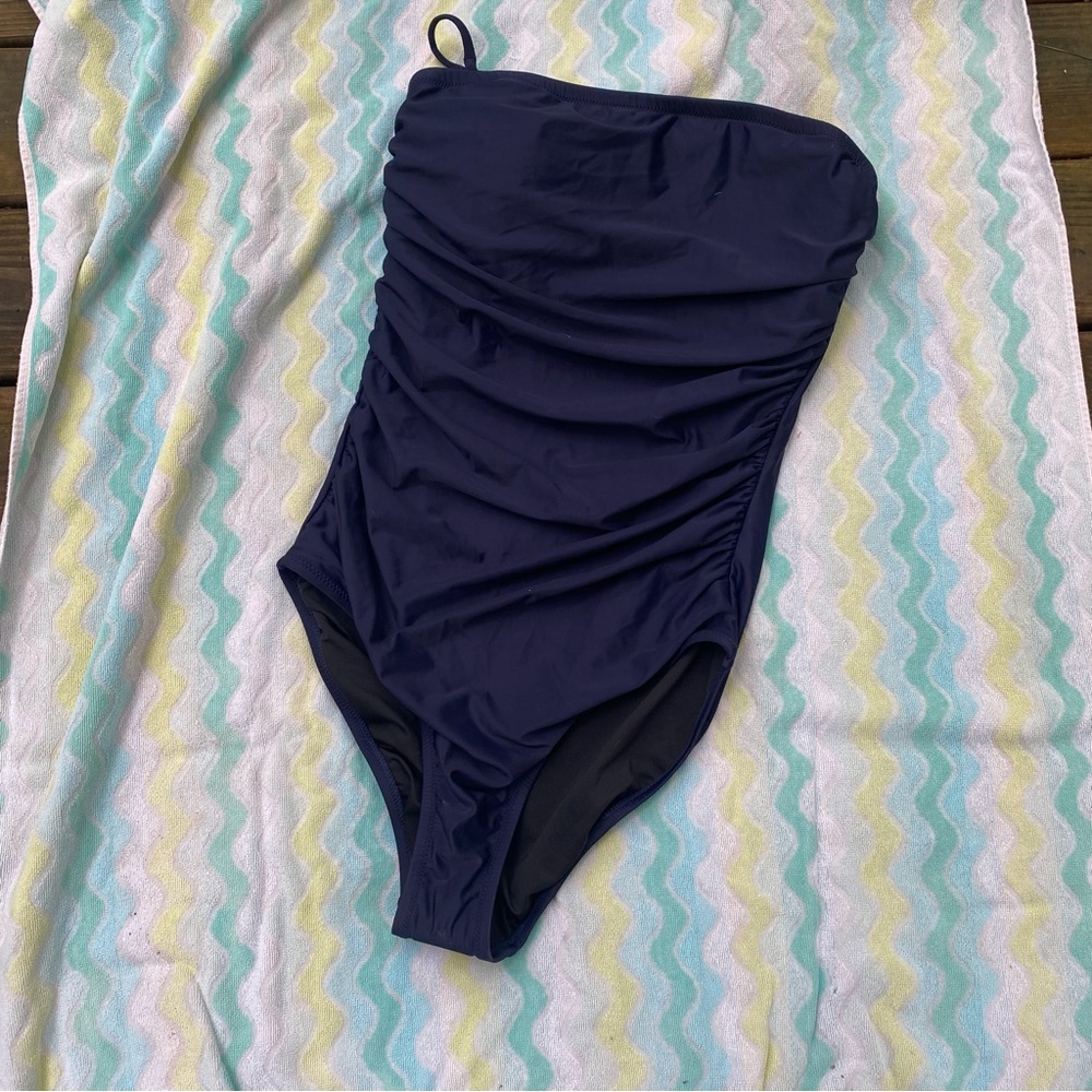 Navy blue jcrew one piece. New with tags and hygiene liner. Size 12.